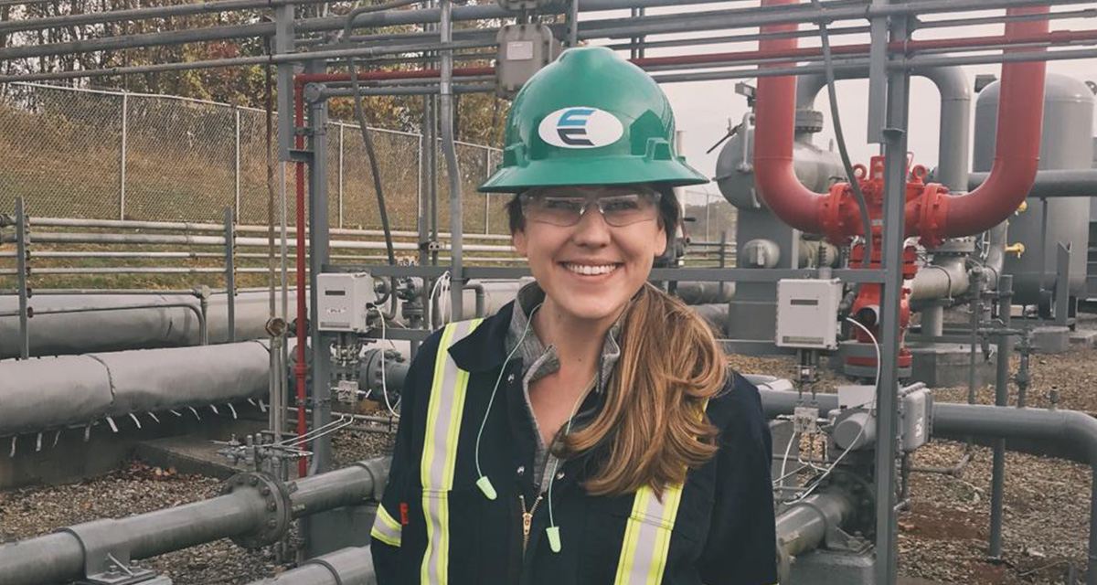 A female Equitrans employee is on an Equitrans site in full PPE.