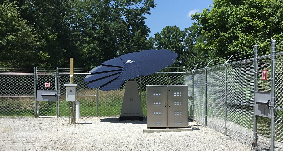 A "Solar Flower" unit generates renewable energy within a fenced-in Equitrans site.